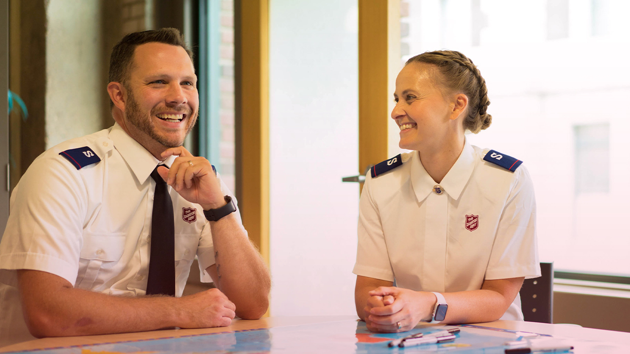 Image of two cadets smiling