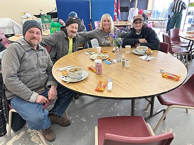 Sinnott shares lunch with friends at Hope CC’s community meal program (Photo: Holly Bain)